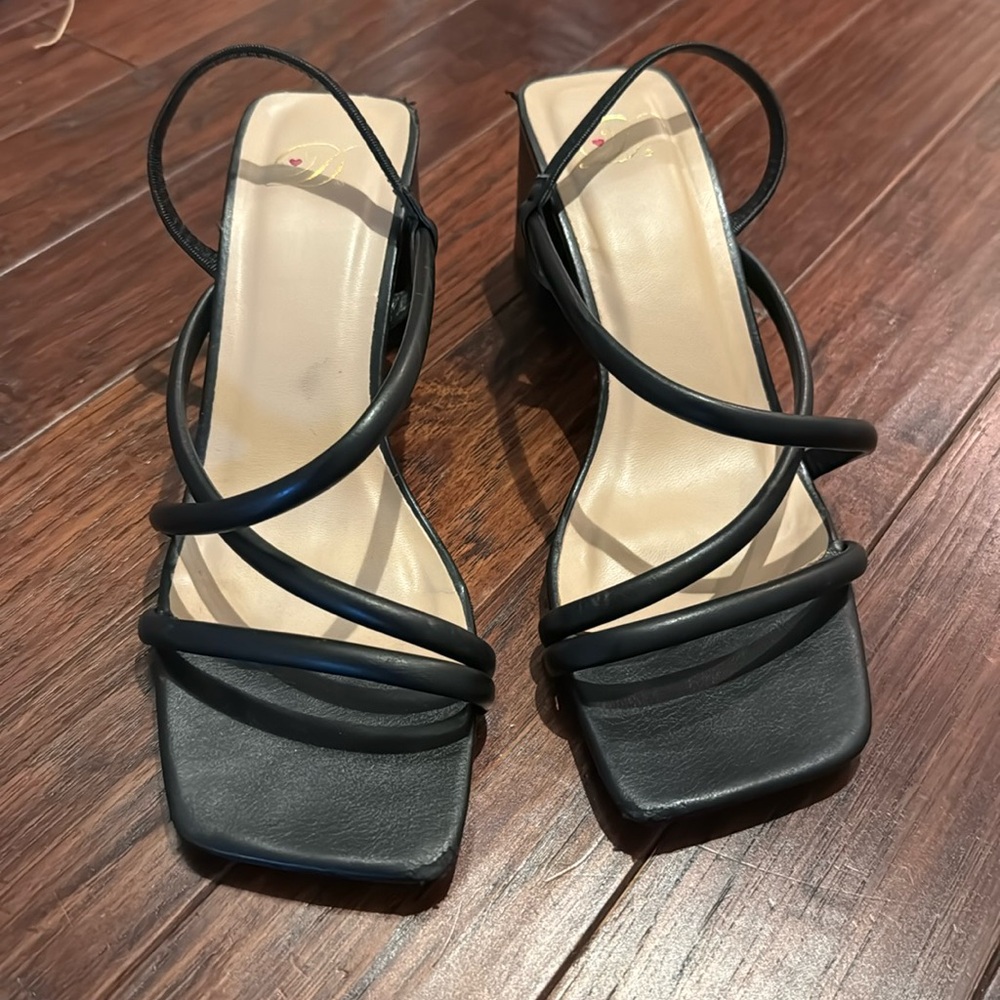 Black strapped kitten heels